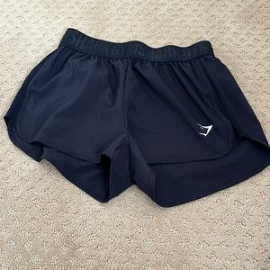 Black Gymshark running shorts size small. Unlined. Never worn.